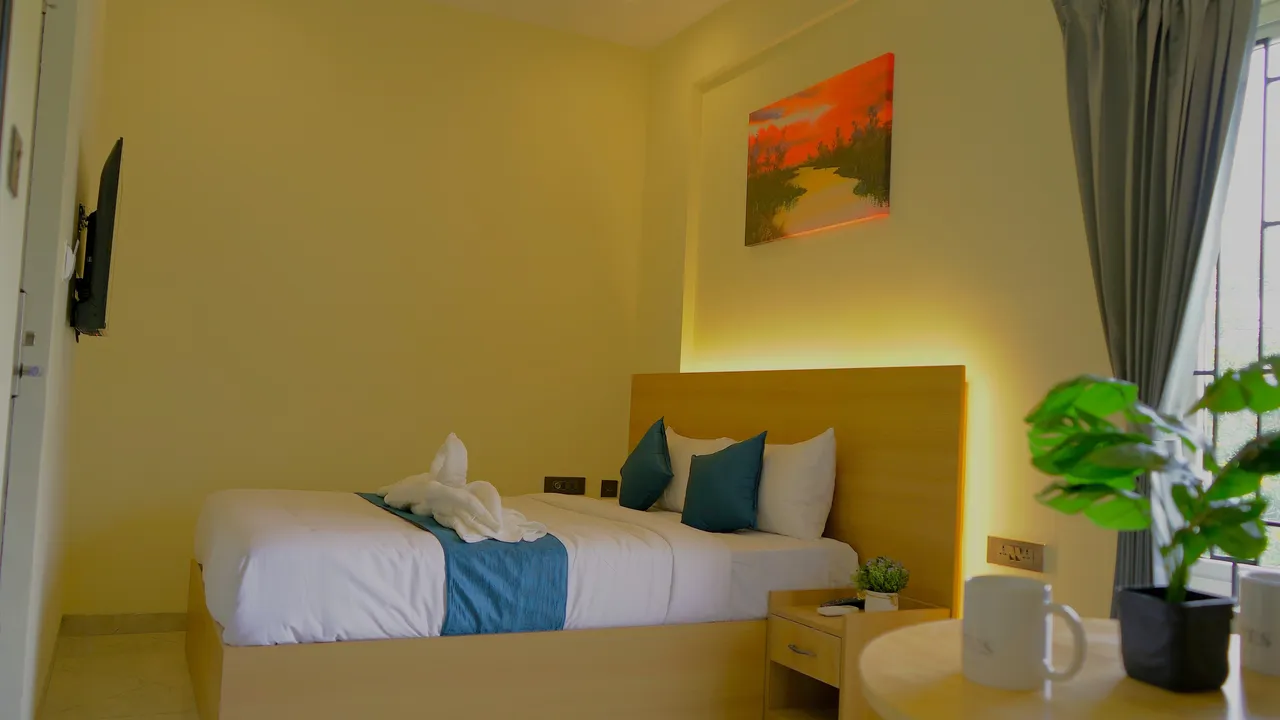 Deluxe Queen Room at Jiana Suites overlooking Arekere Lake, JP Nagar Bangalore