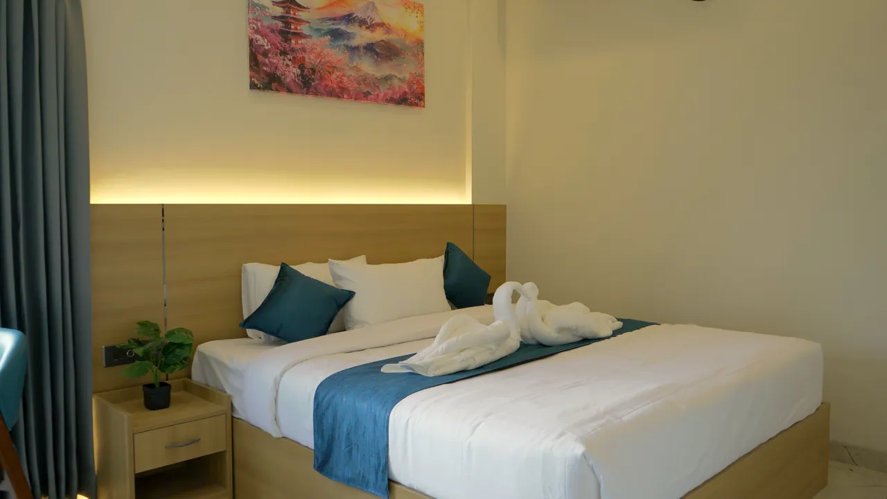 Premium King Partial Lake View Room at Jiana Suites overlooking Arekere Lake, JP Nagar Bangalore