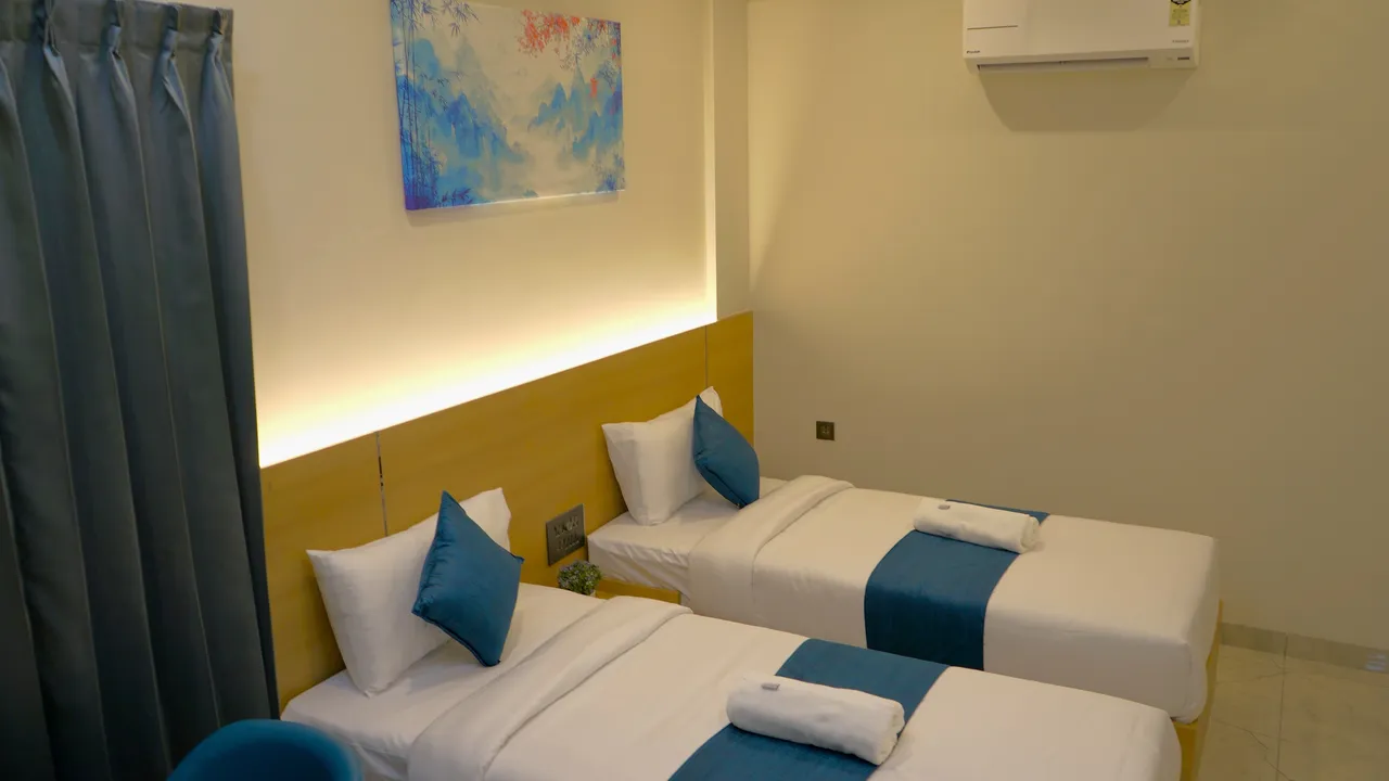 Deluxe Twin Partial Lake View Room at Jiana Suites overlooking Arekere Lake, JP Nagar Bangalore